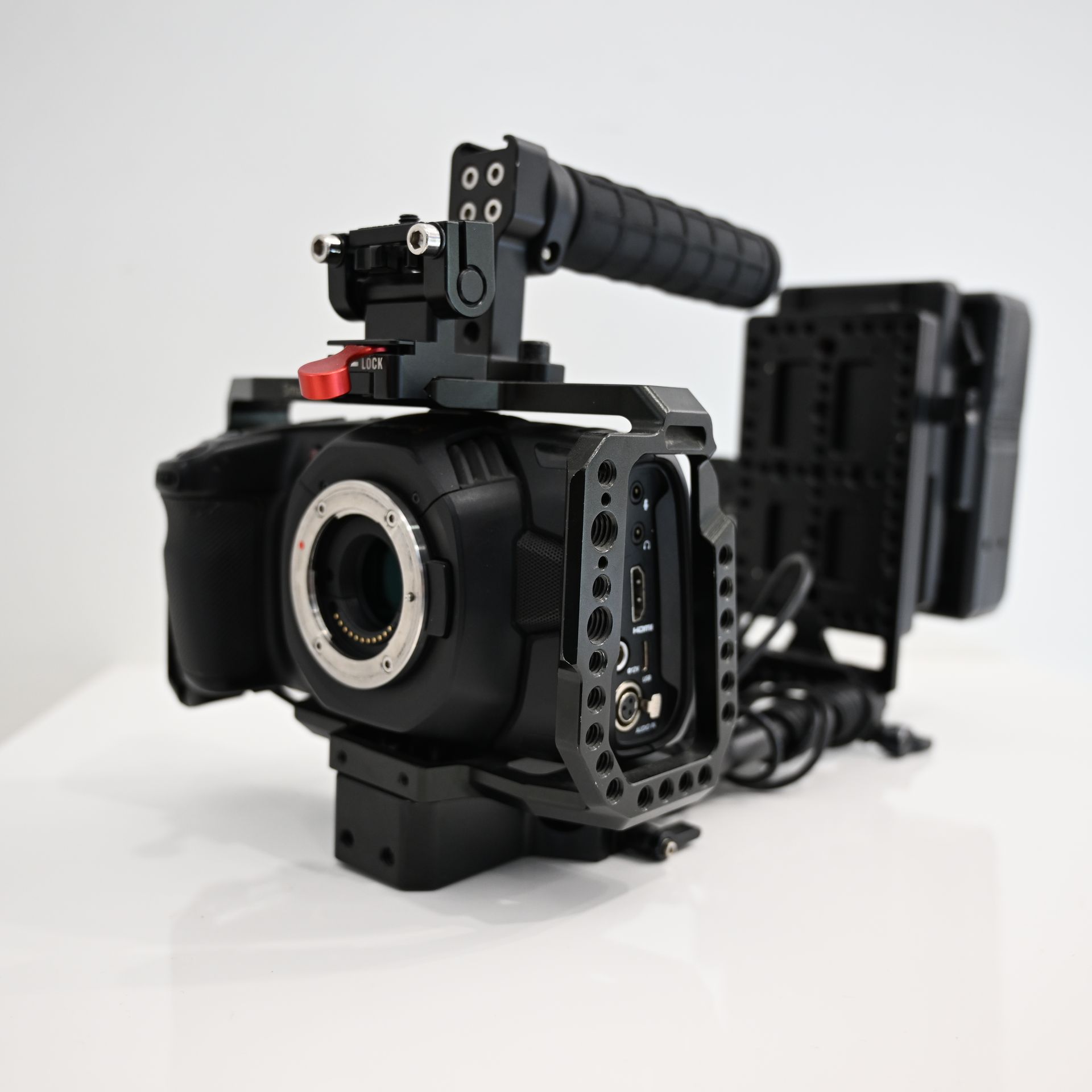USED Blackmagic Pocket Cinema Camera 4K (BUNDLE) with Panasonic Lumix G Vario 14-140mm f/3.5-5.6 + Rokinon 35mm T1.5 Cine DS Lens + Sigma 16mm F1.4 DC DN for MFT + Sigma 56mm F1.4 DC DN for MFT + Ninja Shinobi Monitor + V Mount Battery and cage