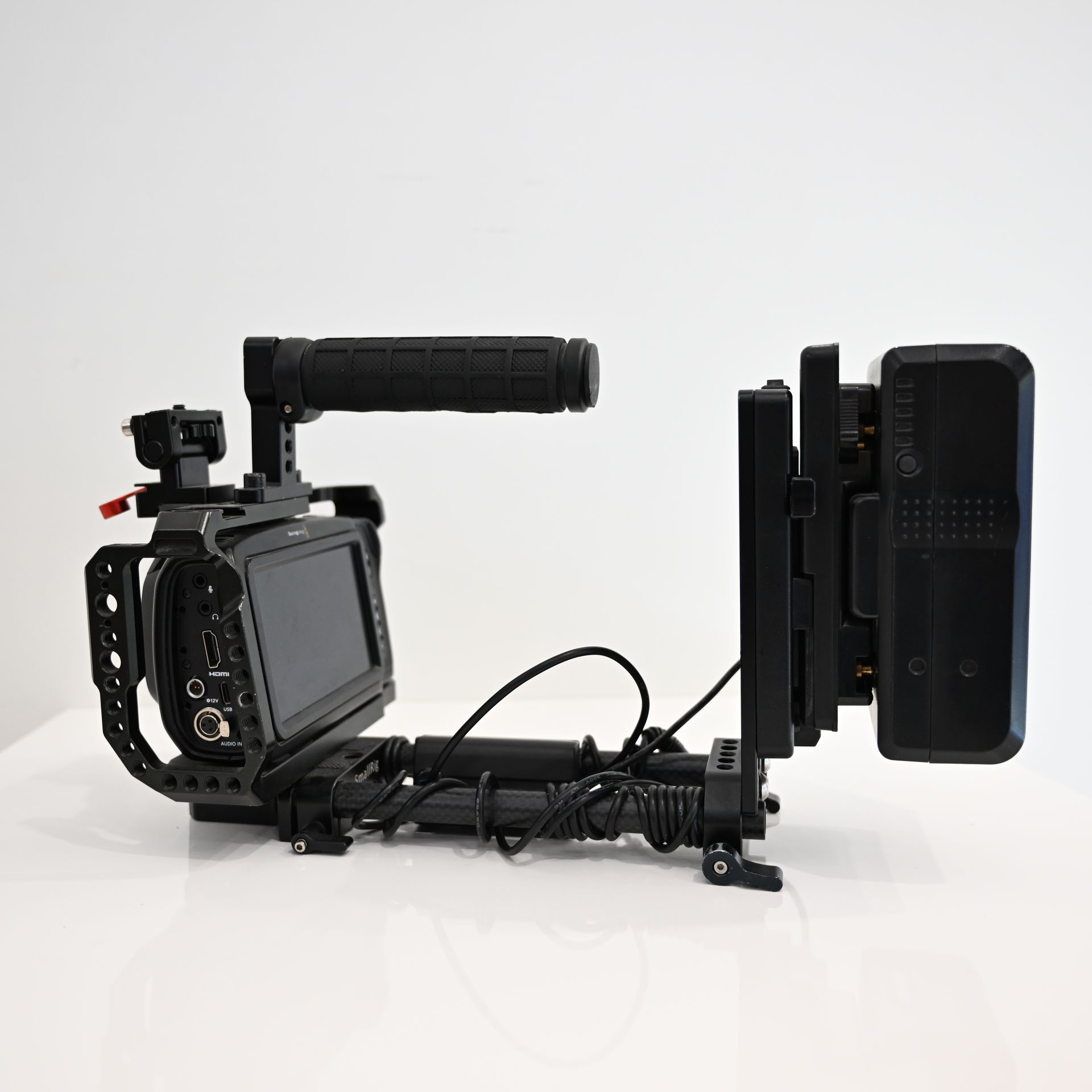 USED Blackmagic Pocket Cinema Camera 4K (BUNDLE) with Panasonic Lumix G Vario 14-140mm f/3.5-5.6 + Rokinon 35mm T1.5 Cine DS Lens + Sigma 16mm F1.4 DC DN for MFT + Sigma 56mm F1.4 DC DN for MFT + Ninja Shinobi Monitor + V Mount Battery and cage