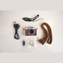 Promage Mini PC-80 in the box: camera, USB cable, neck strap, wrist strap